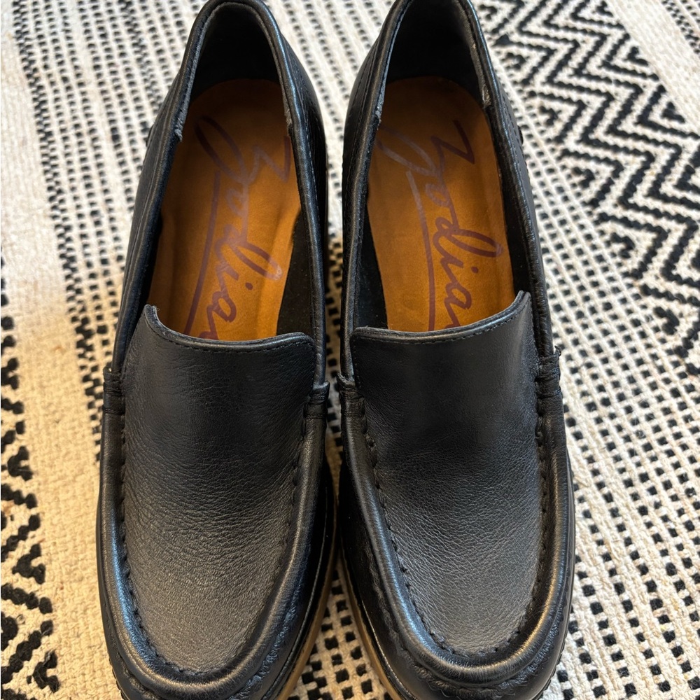 Black rubber platform loafers